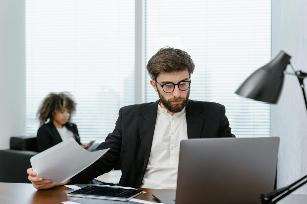 Person working on a laptop, practicing smart online habits to save time and money